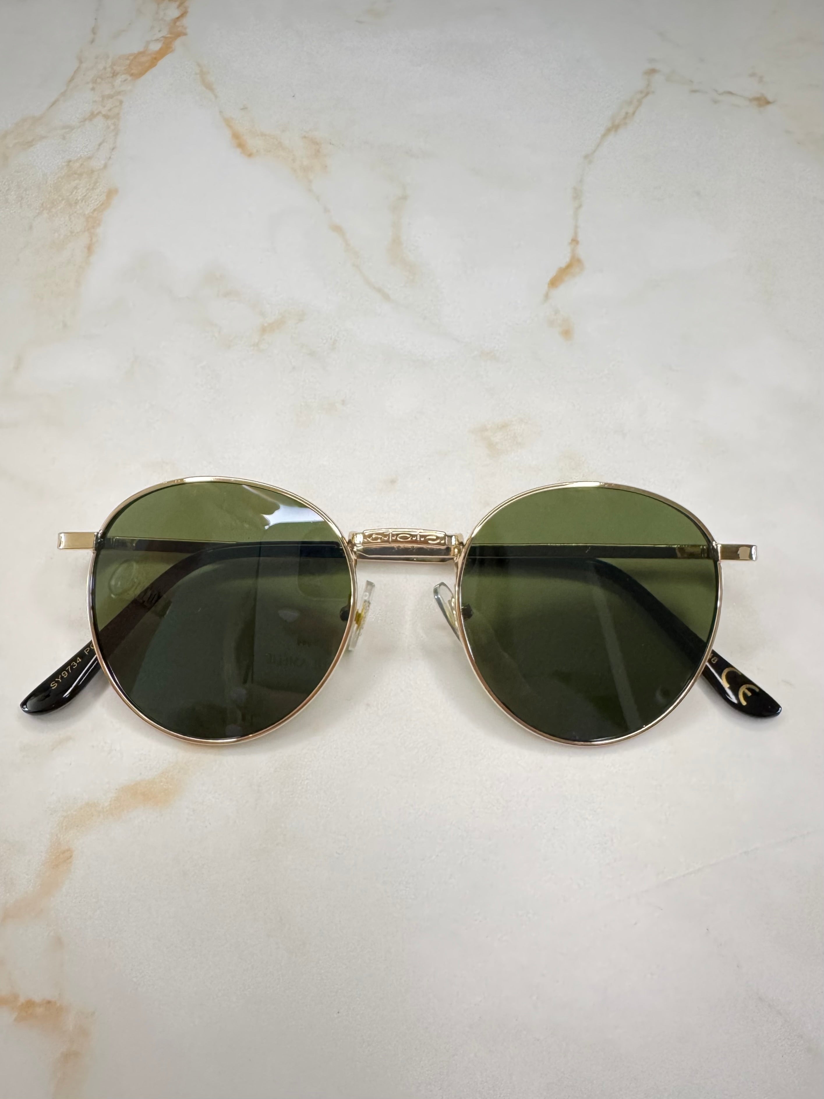 Raya - Zonnebril rond goud - groen