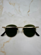 Raya - Zonnebril rond goud - groen