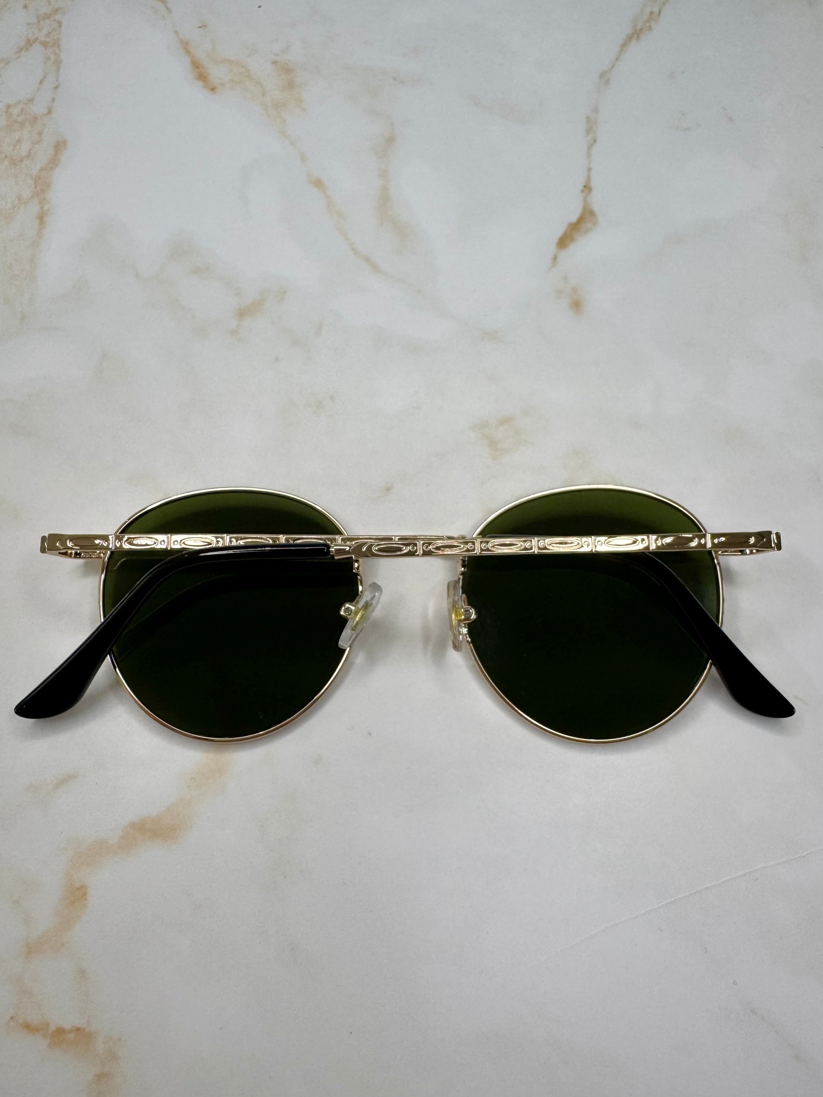 Raya - Zonnebril rond goud - groen