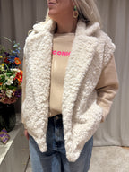 Rosita - Azzurro bodywarmer teddy stof - offwhite