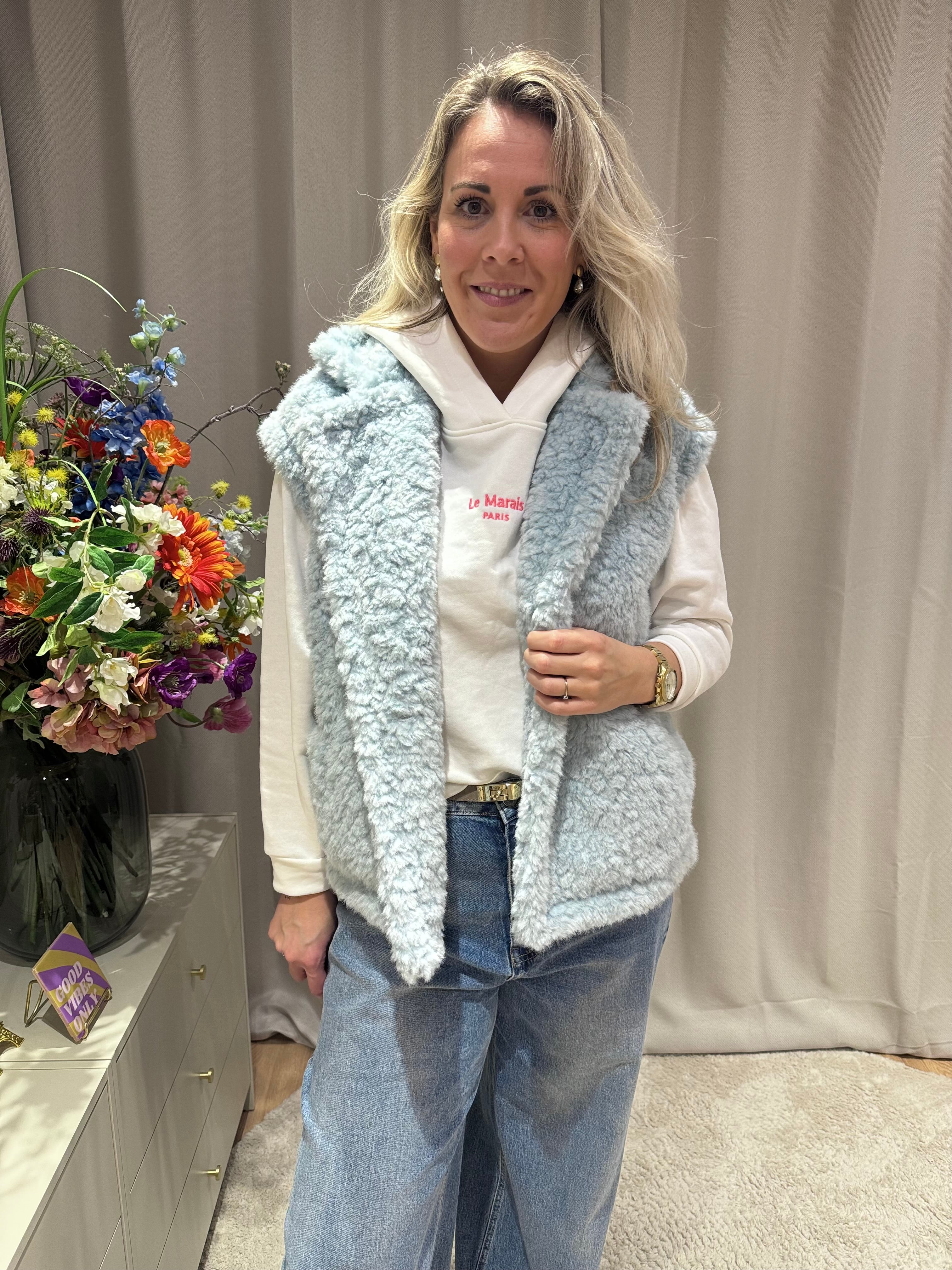 Rosita - Azzurro bodywarmer teddy stof - lichtblauw