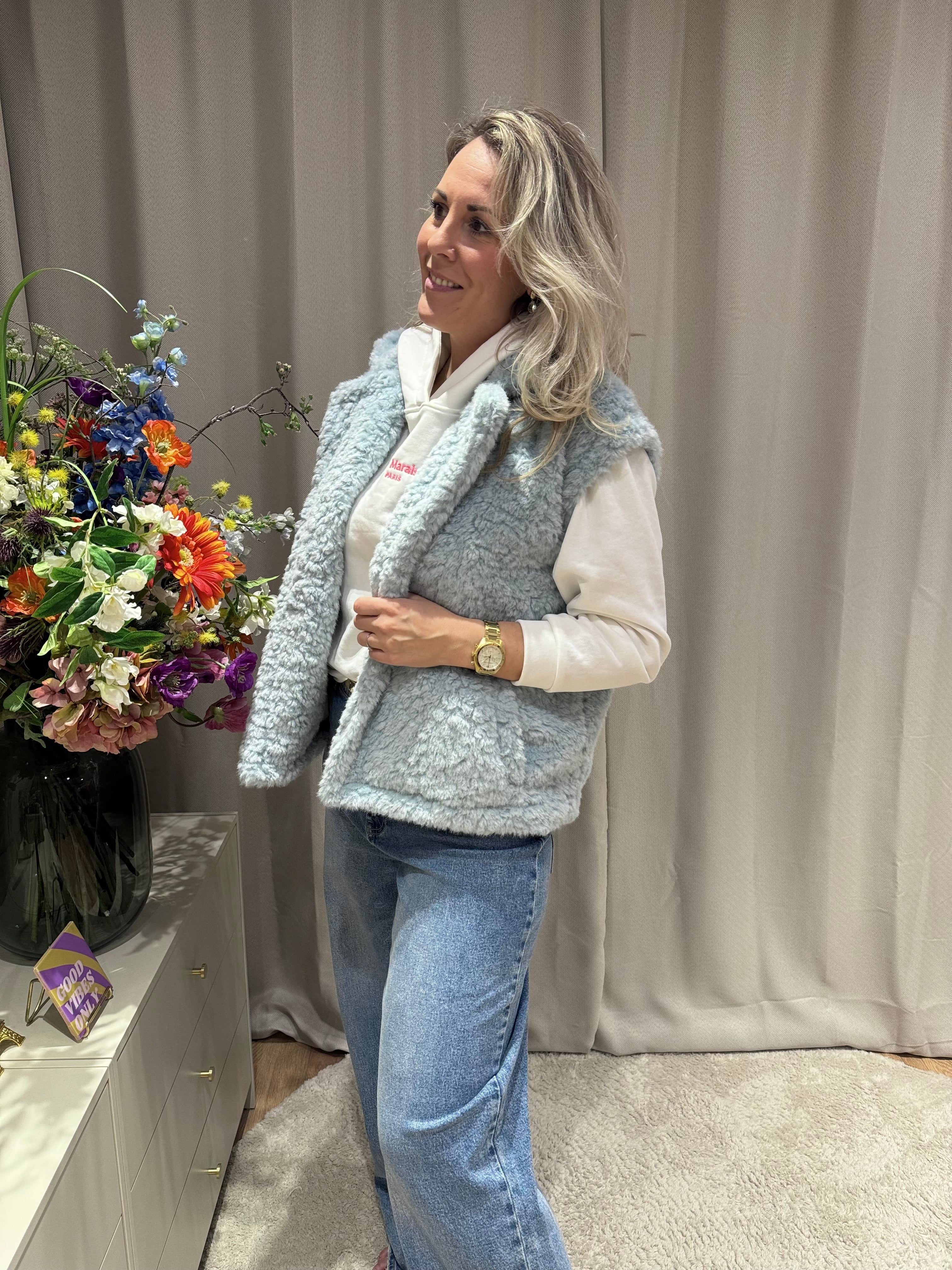 Rosita - Azzurro bodywarmer teddy stof - lichtblauw
